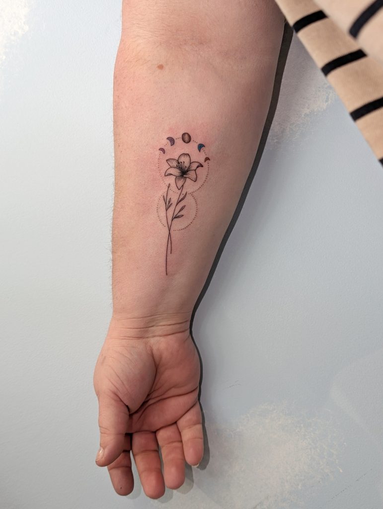 1000002376 Delicate dandelion arm tattoo by Leanne at Kimmer Ink Tattoo Studio in Eastleigh, Hampshire.