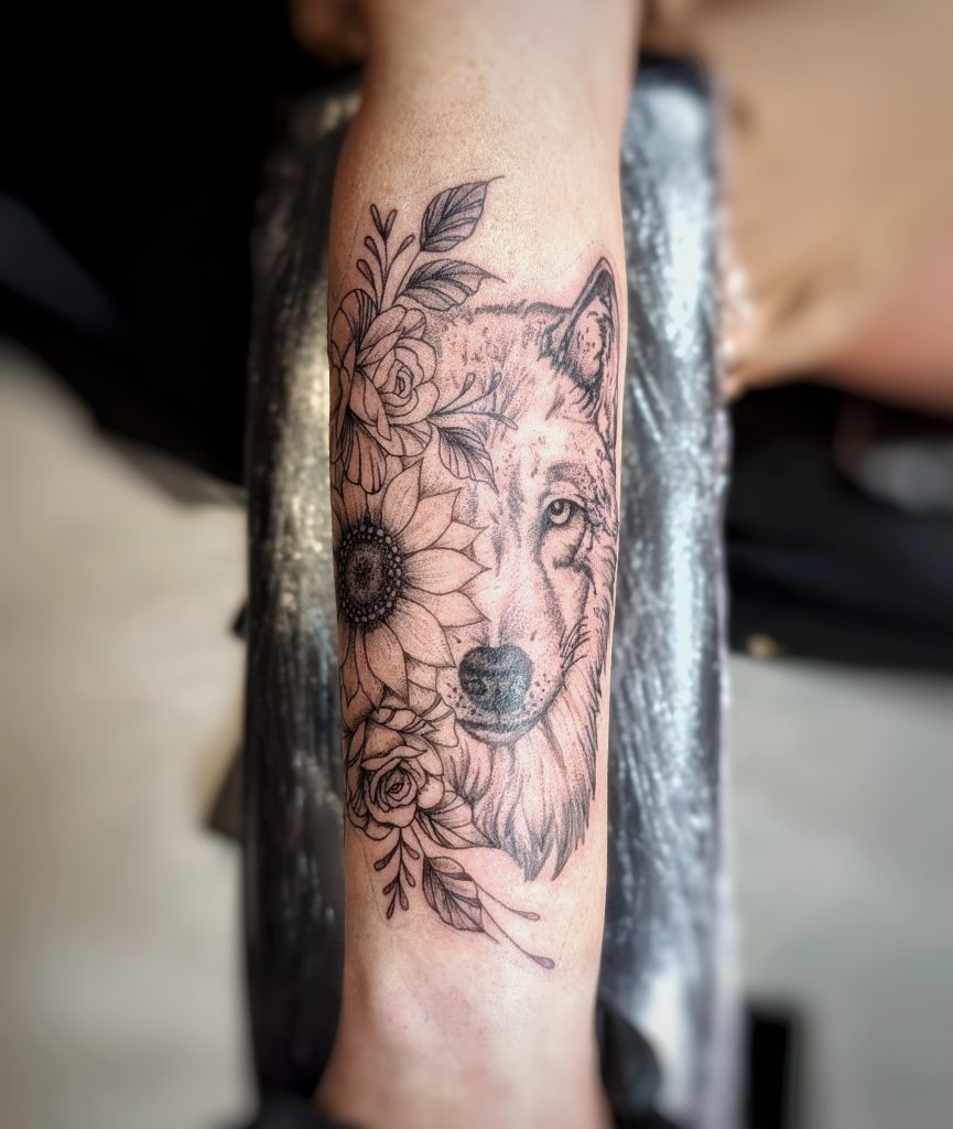 1000012099 Detailed wolf portrait forearm tattoo by Leanne at Kimmer Ink Tattoo Studio in Eastleigh, Hampshire.
