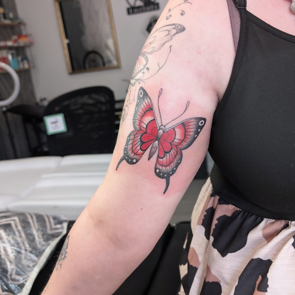 IMG_20250622_185905_977 Colourful butterfly forearm tattoo by Leanne at Kimmer Ink Tattoo Studio in Eastleigh, Hampshire.