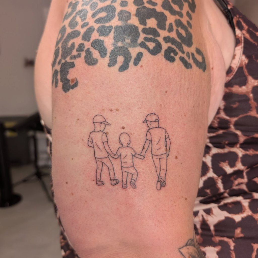 IMG_20250724_090612_110 Minimalist outline family portrait tattoo by Leanne at Kimmer Ink Tattoo Studio in Eastleigh, Hampshire.