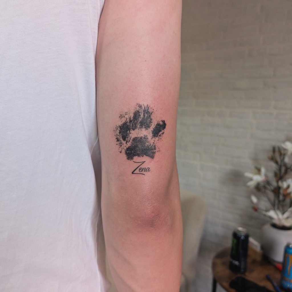 IMG_20250731_175951_640 Small paw print ankle tattoo by Leanne at Kimmer Ink Tattoo Studio in Eastleigh, Hampshire.