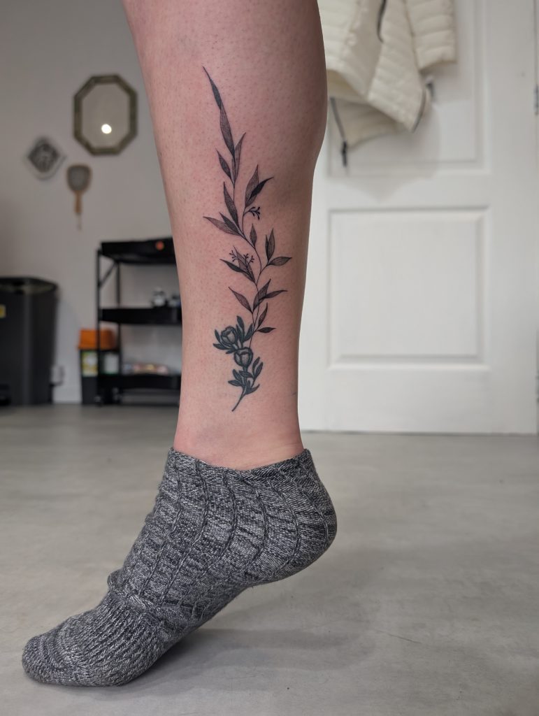 PXL_20250423_160804919.MP Fine line vine leg tattoo by Leanne at Kimmer Ink Tattoo Studio in Eastleigh, Hampshire.