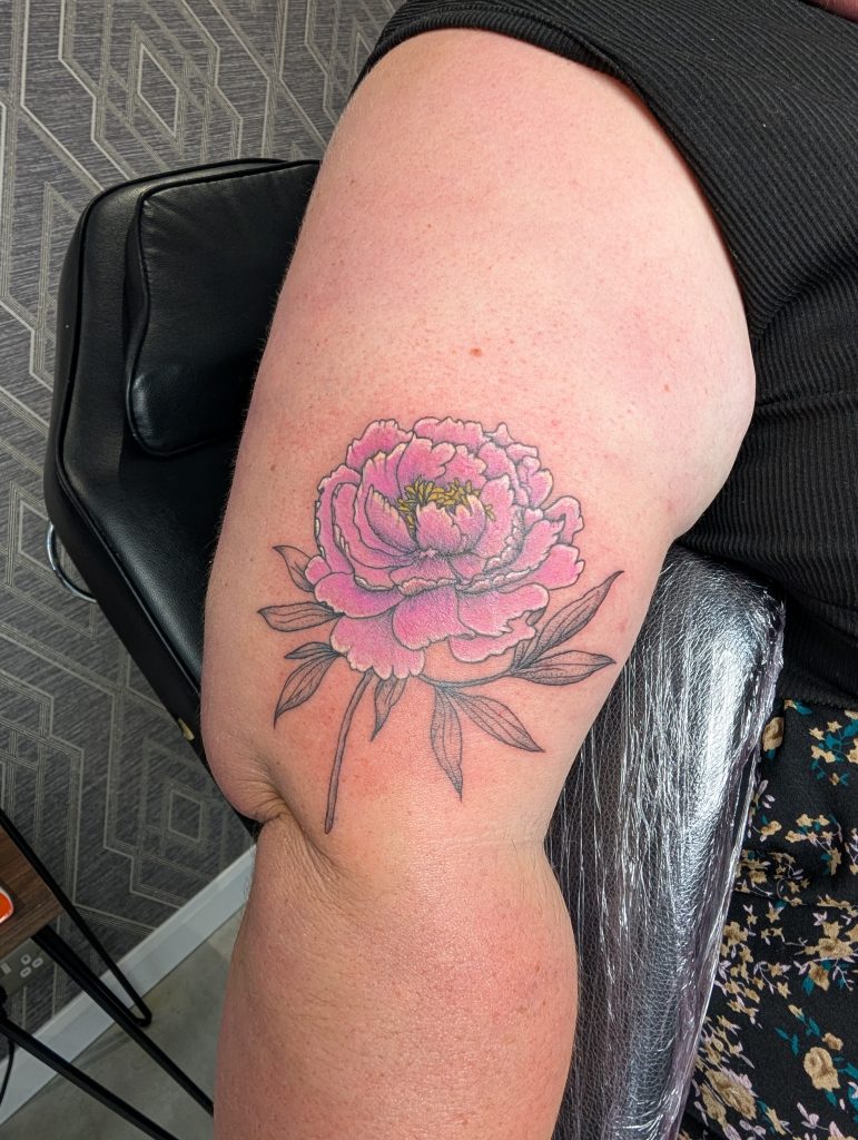 PXL_20250804_125651722.MP Black and grey rose arm tattoo by Leanne at Kimmer Ink Tattoo Studio in Eastleigh, Hampshire.