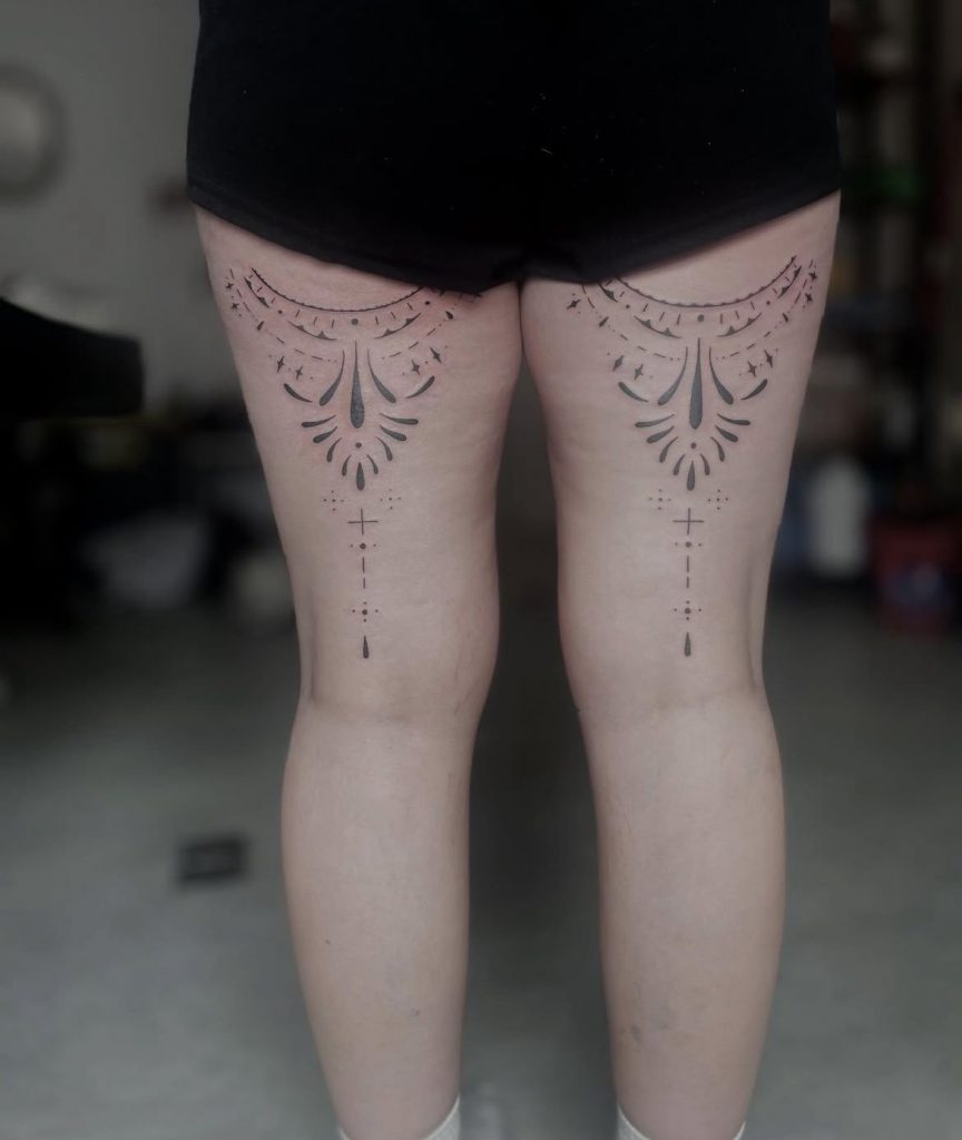 b76d5011-51ee-4d5a-8bee-64cf389b03e7 Symmetrical ornamental dotwork tattoos on the upper thighs by Loren at Kimmer Ink Tattoo Studio in Eastleigh, Hampshire.